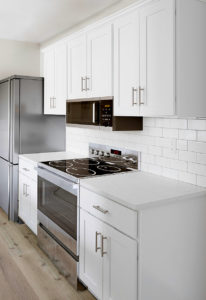 Devonshire Village lower apartments: kitchen perimeter cabinets and work surface counters