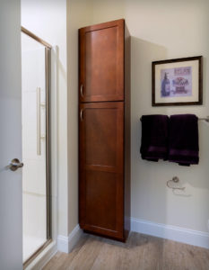 Custom linen cabinets in the bathrooms at Regency Village, Merrimac, MA.