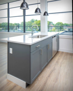 View of the rear of the kitchen islands at the U-Shaped Apartments at Colt Gateway where Viking Kitchens has installed kitchens and bathrooms.